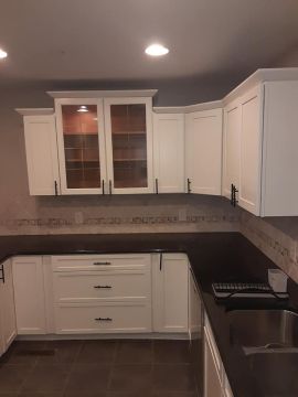 KSG Superior Painting LLC finishes cabinets in Berkeley Lake